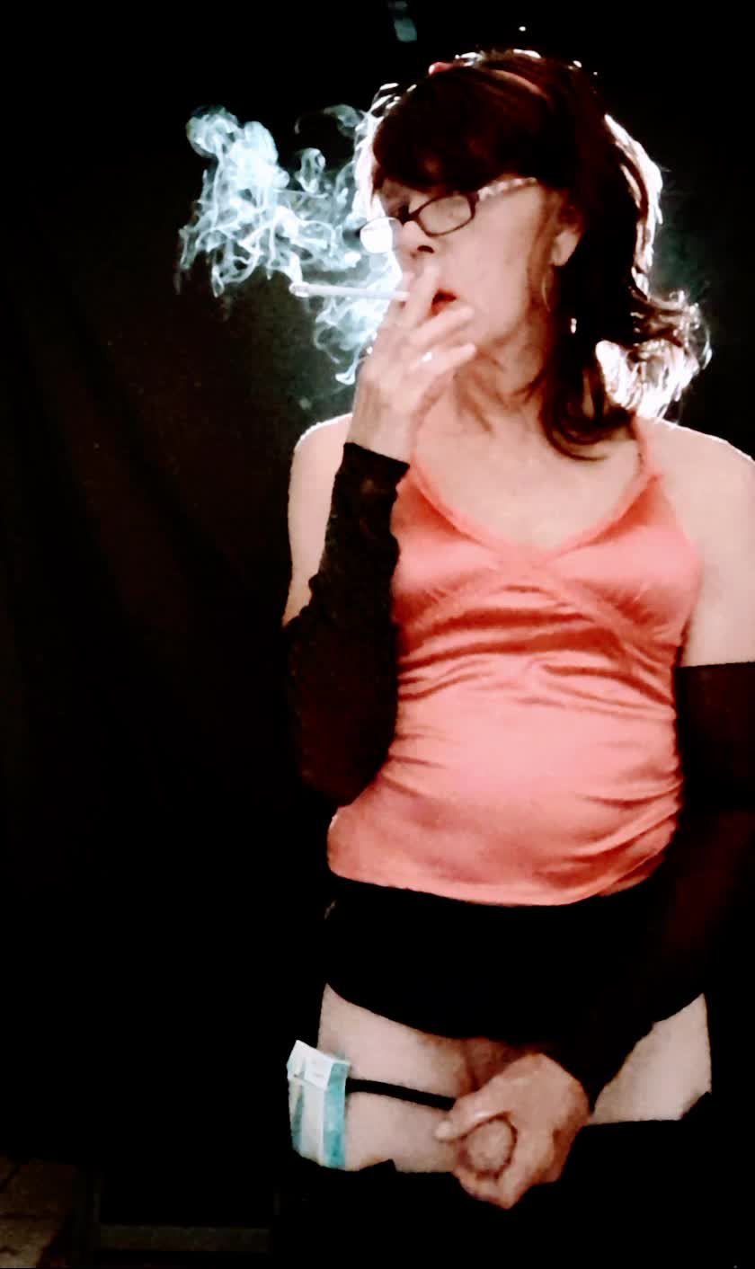 Sissy posing while she Smokes and Strokes pumping her pussy