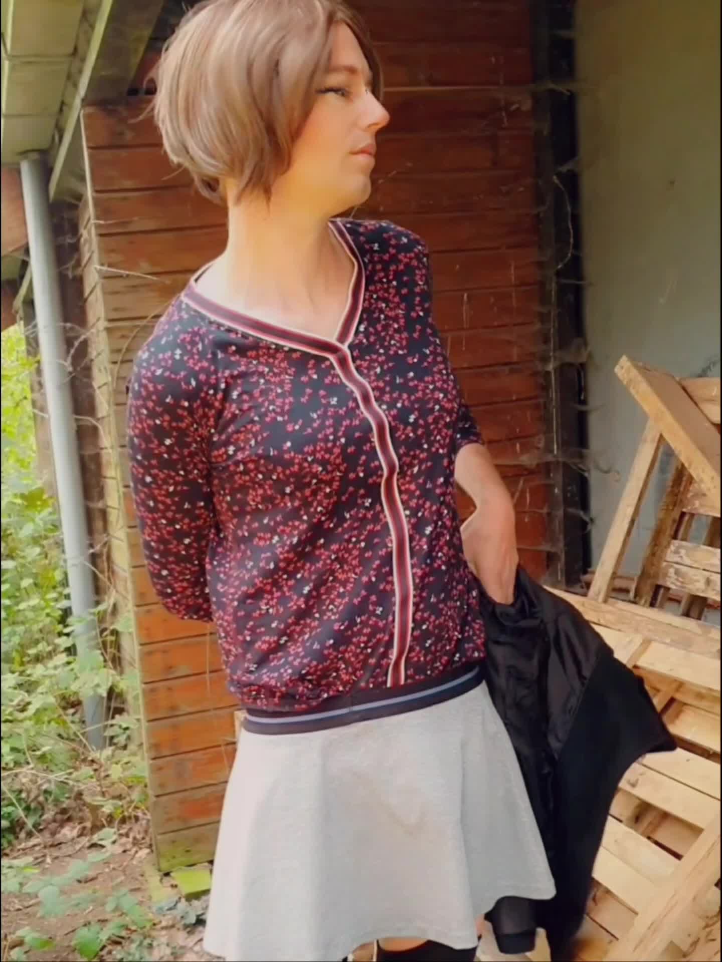 Annemieke playing in front of abandoned restaurant